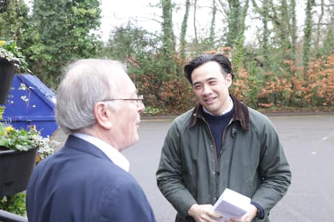 Listening to a resident outside Beaconsfield Town Hall