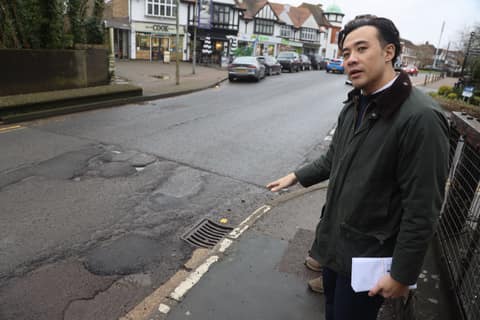 Pointing out potholes on a Beaconsfield road