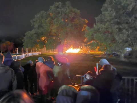 Crowd watching the bonfire at Beaconsfield Cricket Club